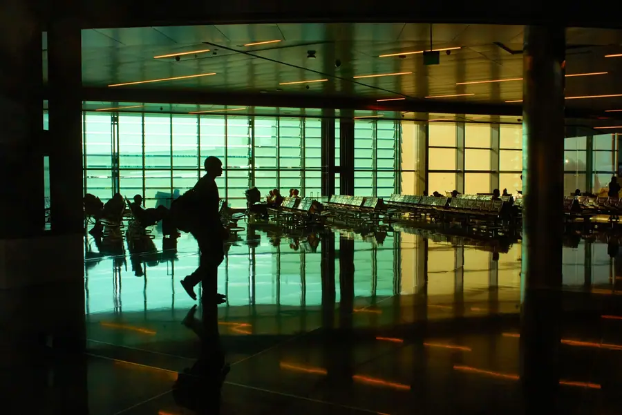 Traveller crossing an airport terminal